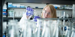 Student mixing chemicals at UBCO labratory